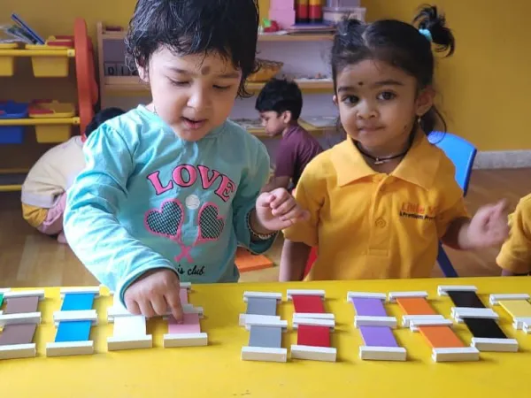 Little Ville activity area — children engaged in creative play and learning